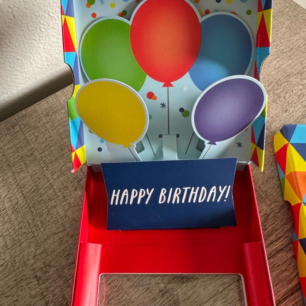 Colorful Geometric Gift Box with Red Ribbon - Picture 4 of 9